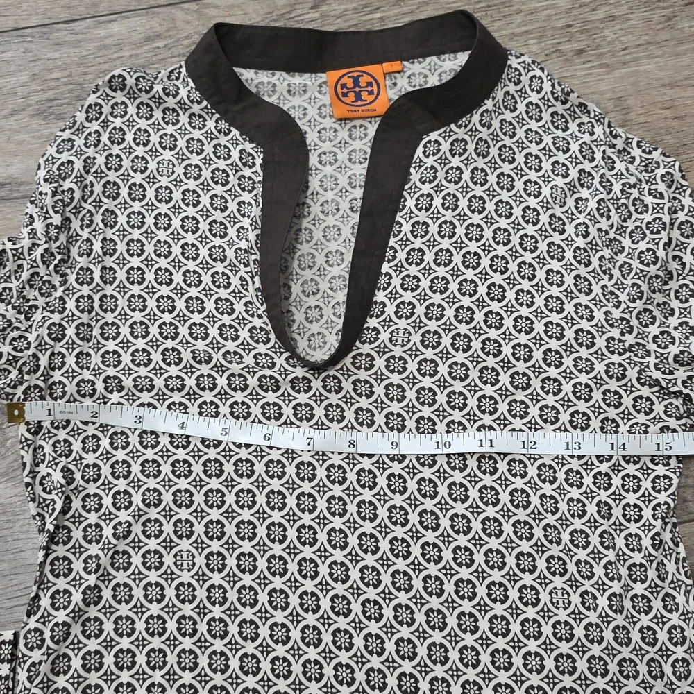 Tory Burch printed tunic top featuring a split neckline and long sleeves